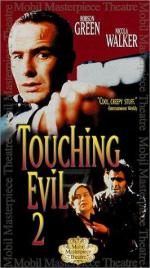 Touching Evil: 266x475 / 39 Кб