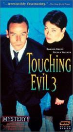 Touching Evil: 263x475 / 32 Кб